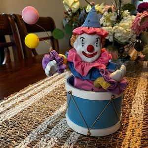 Vintage wind up clown.